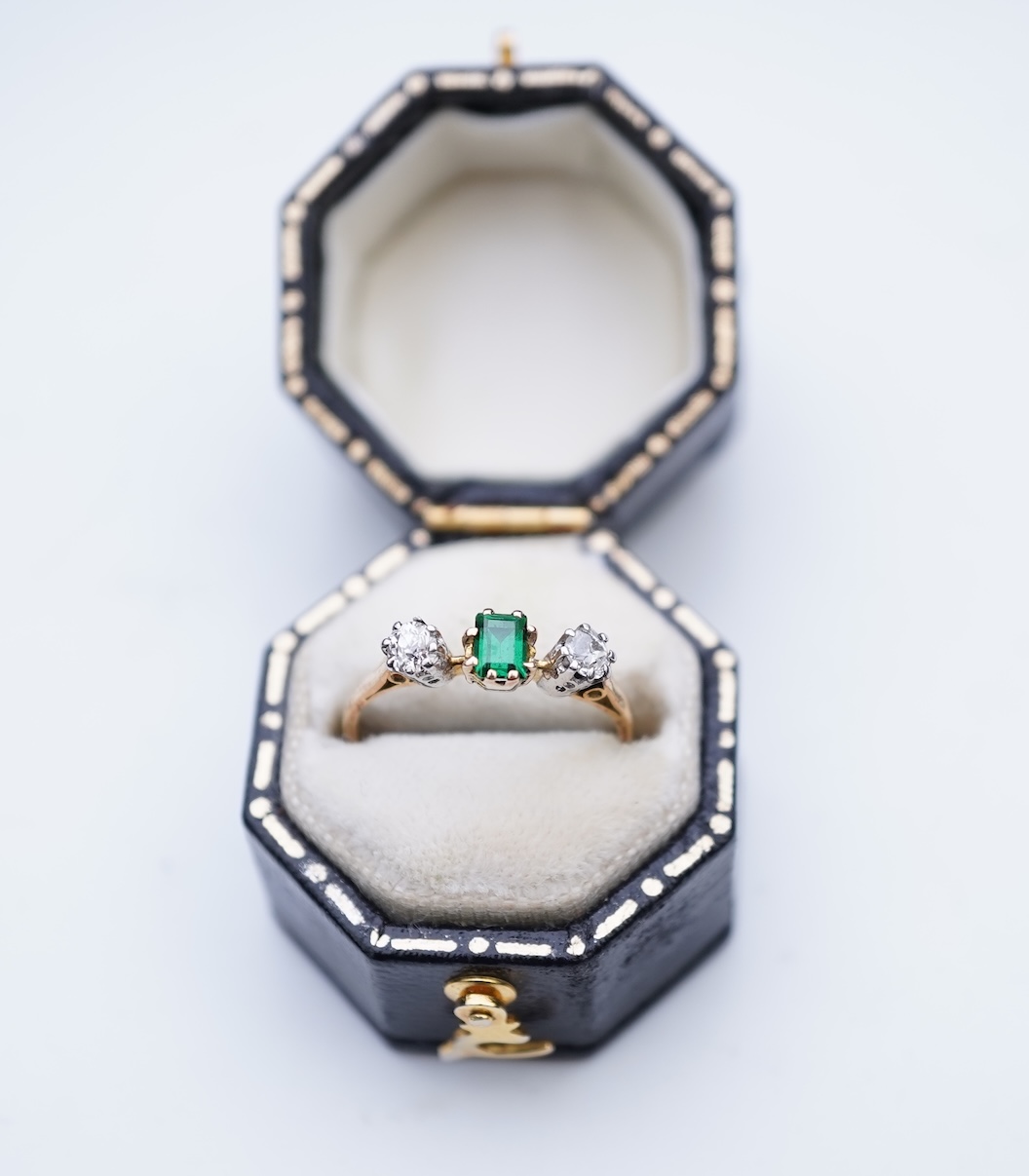 A tsavorite and diamond ring